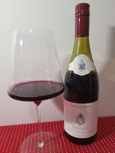 Famille Perrin Ventoux Rouge, 2022 with wine in glass