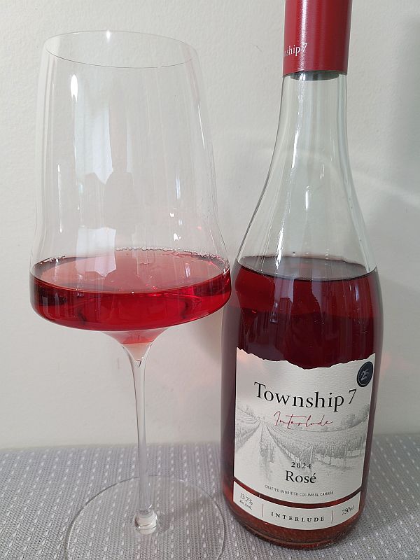 Township 7 Interlude Rosé 2024 with wine in glass