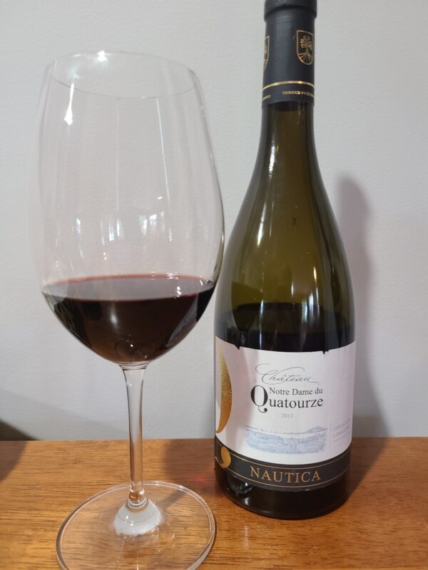 Chateau Notre Dame du Quatourze 2011 with wine in glass