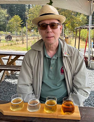 Karl MyWinePal with a flight of ciders from Junction Orchard & Cidery